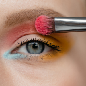 eye with makeup brush